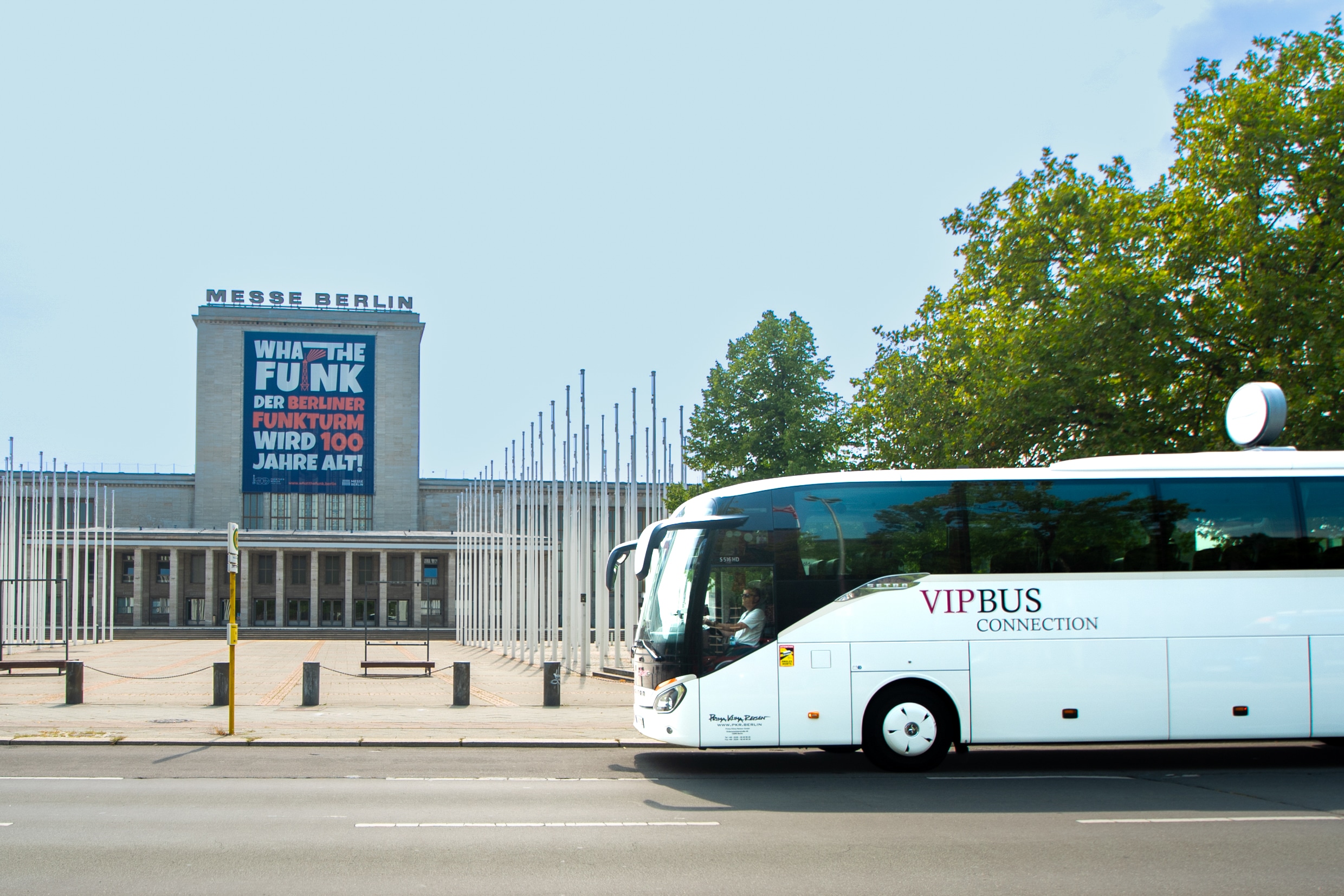 Prima Klima Reisen coach in front of the Messe Berlin exhibition grounds