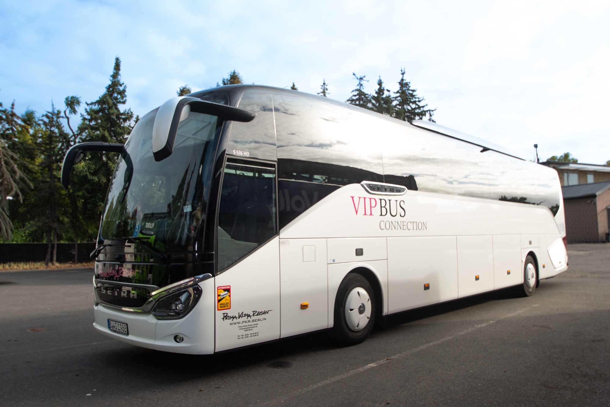 White L-Class coach from the outside
