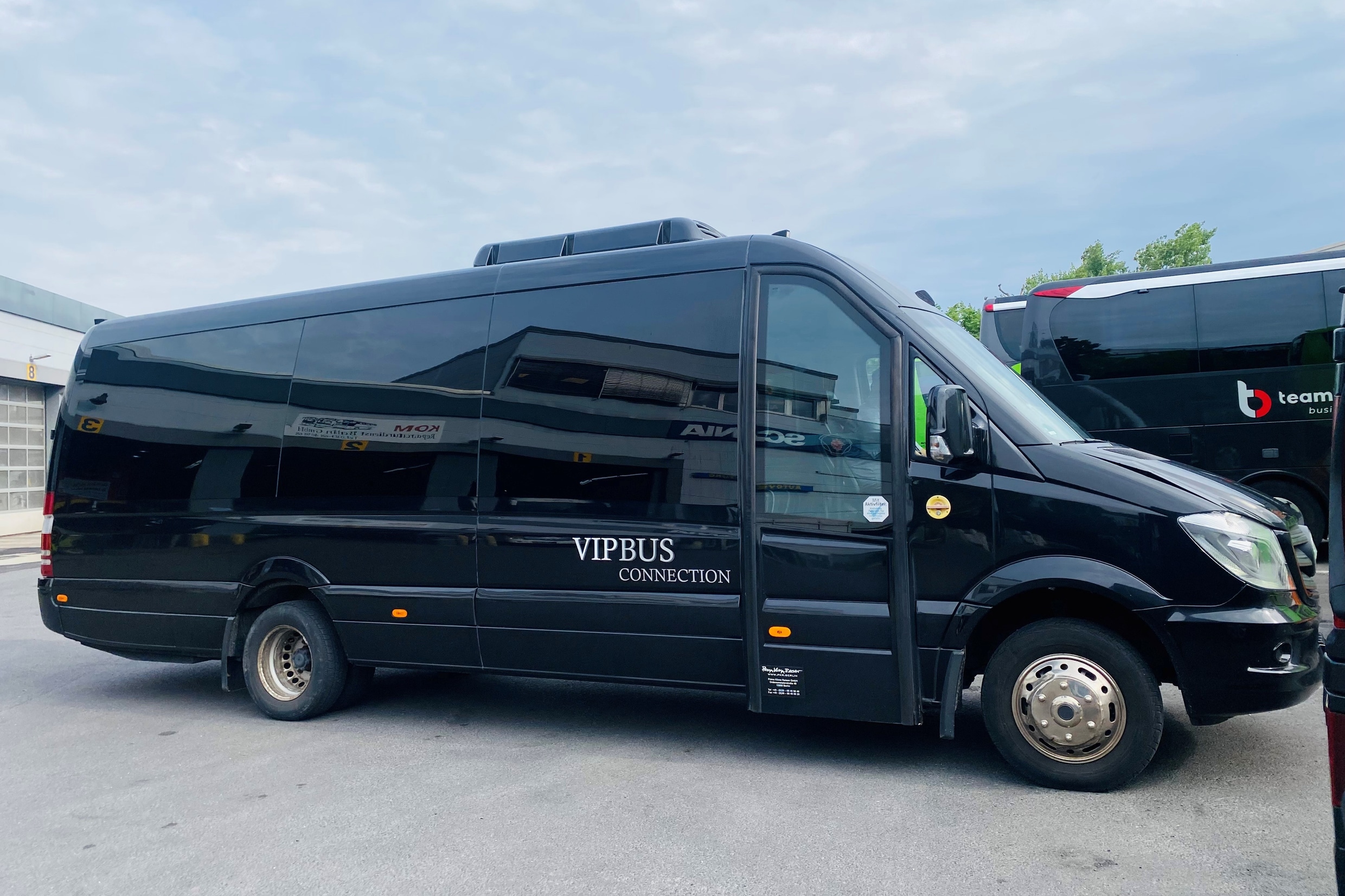 Black S-Class minibus from the outside