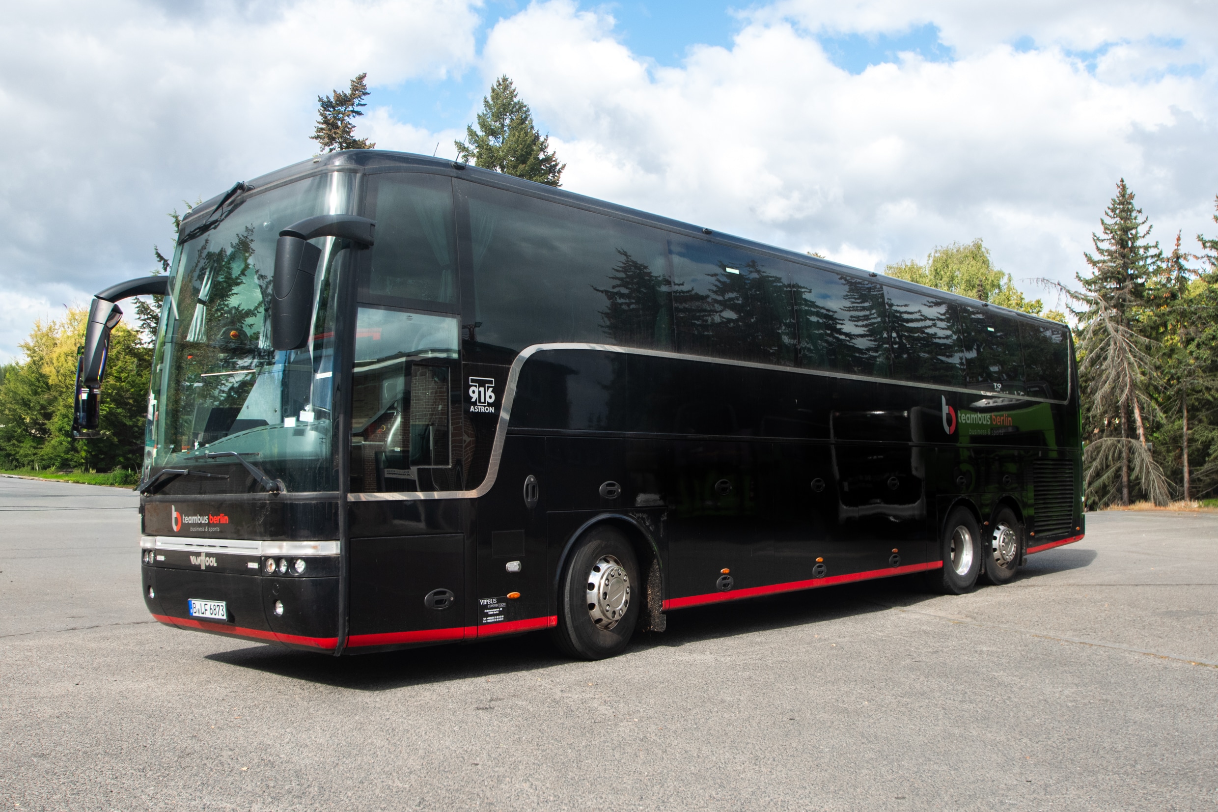 Black Teambus Van Hool from the outside