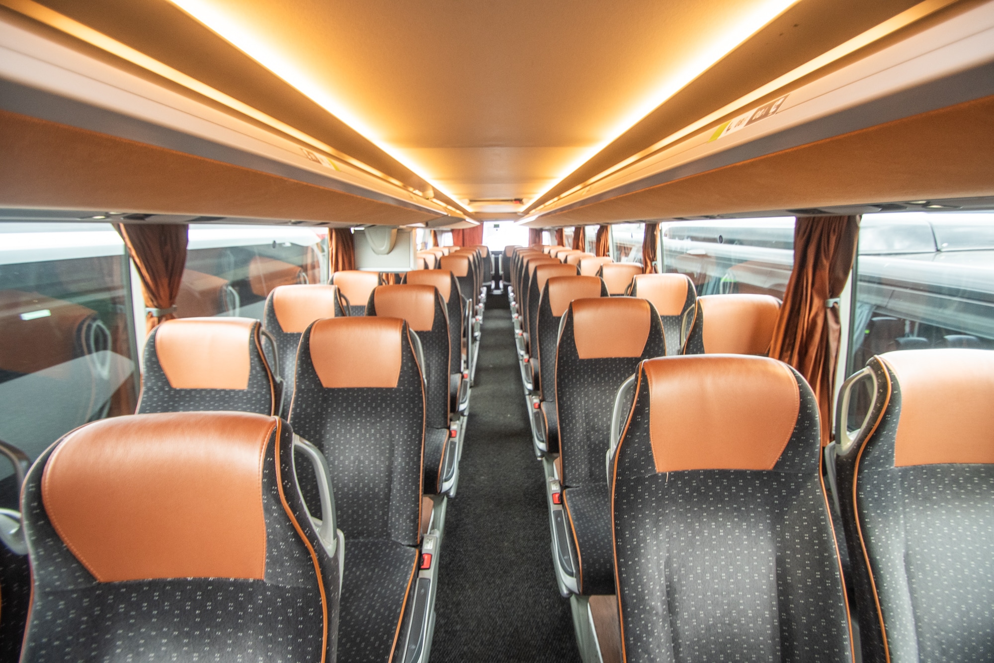 XXL-Class interior: rows of seats under the ceiling lighting